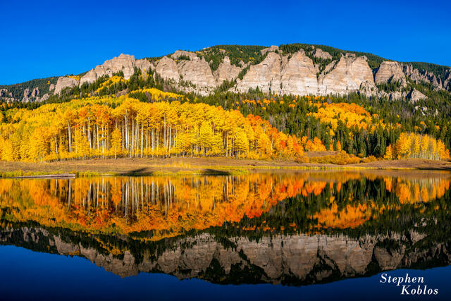  Mountains and Aspens with reflection in Clear Lake in the fall